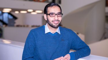 Student Hasan standing in the Diamond
