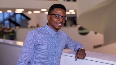 Student Kelvin standing in the Diamond