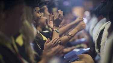 Students clapping