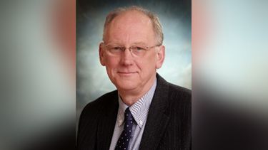 A portrait shot of Professor Chris Newman, Interim Vice-President and Head of Faculty.