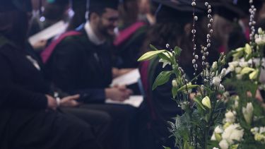 Blurry image inside grad hall