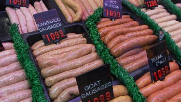 Variety of sausages, including kangaroo sausages, on display at a butcher’s stall in Queen Victoria Market