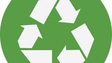 A circular green icon with three white arrows creating a triangle shape