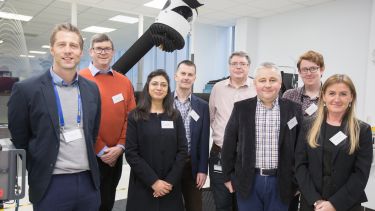 Representatives from the EPSRC, NSI-UK and EEE in the mm wave measurement lab