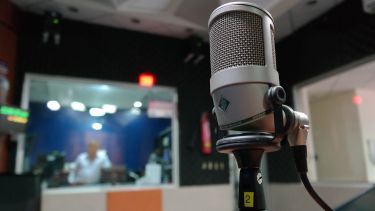 Stock image of a microphone in a studio