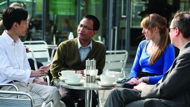 Philosophy staff and students in discussion outside Jessop West.