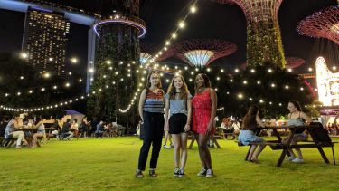 Clare and her friends at an event in Singapore