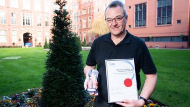 Professor Steven Armes outside firth court with innovation award