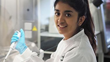 A profile picture of Saylee Jangam. She is in the lab. 