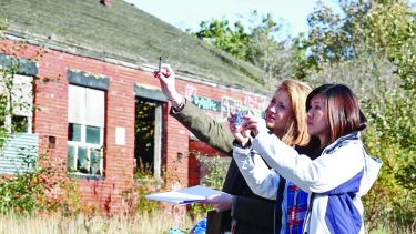 Urban Studies students on a field trip taking pictures