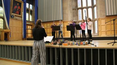 small group playing on stage