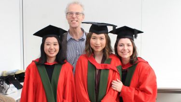 Landscape graduates with supervisor