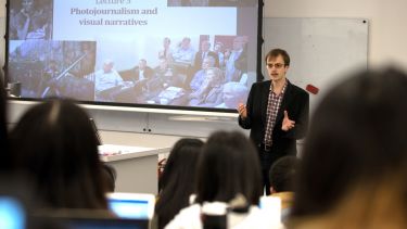 Dr Dmitry Chernobrov delivering a Photojournalism and visual narratives lecture. 