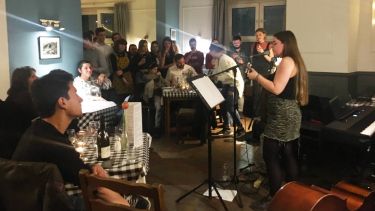 French students and staff during their music evening