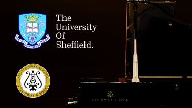 Steinway piano with Department of Music logo