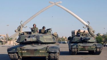 Soldiers in military tanks in the city of Baghdad. 