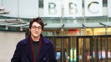 Journalism graduate Ben Cooper outside a BBC building