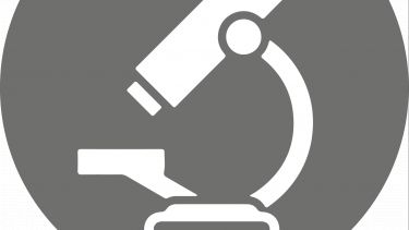 A graphic of a microscope in a grey circle