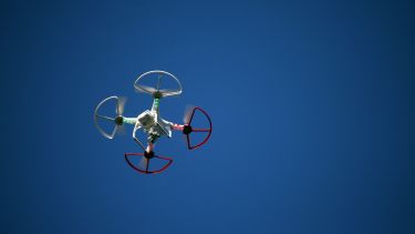 Drone flying through the sky