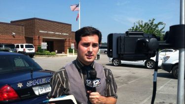 Journalism graduate James Mahon reporting outside a Tennessee courthouse