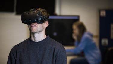 A students wearing a VR headset