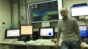 Professor Lee Thompson in the control room of the SuperKamiokande detector