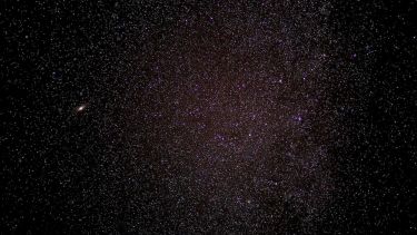 Starry sky, a small galaxy is visible