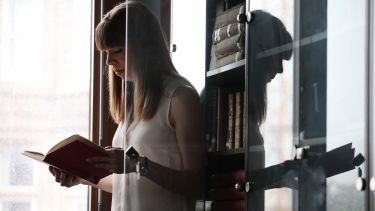 A History student reading in the library.