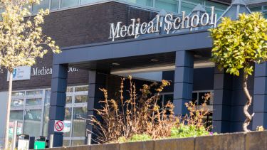 An image of the main entrance of the Medical School.