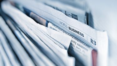 A bunch of business newspapers