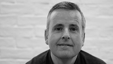 Black and white photo of Iestyn Edwards