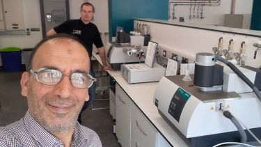A photo of Oday Hussein in the basic characterisation laboratory at the Royce Discovery Centre