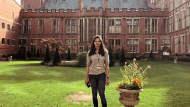 Bhadra standing on the grass in the sunny court yard at Firth Court