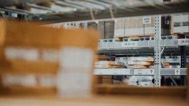 View of a warehouse with shelving in the bacground