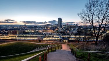 Evening-time panorama of the city of Sheffield taken from behind Sheffield train station.