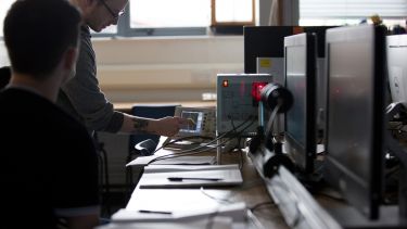 Students in a physics laboratory