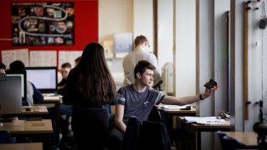Students in a physics laboratory