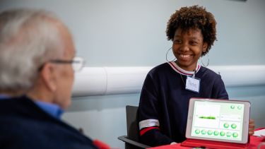 Female student with elderly patient