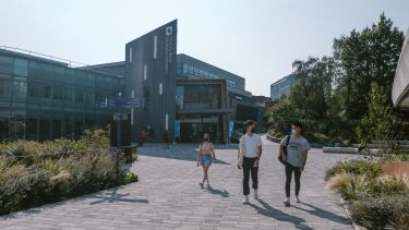 Students outside Students' Union wearing masks