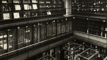 A black and white photograph of the Alfred Denny Museum