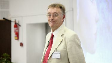 Professor Roger Moore at a conference 
