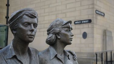 A close up image of the Women of Steel statue