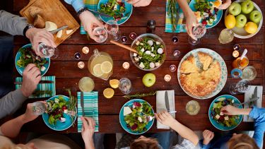Multi-generation family having a delicious dinner