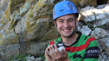 Image of Jamie Thompson holding a chick