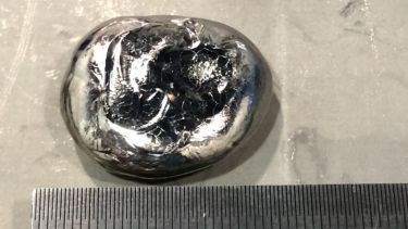 An image of tungsten-tantallum alloy when melted by the Arc Melter