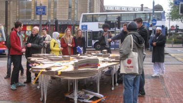 people gathering in Castlegate