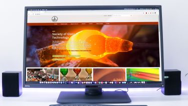 Monitor displaying the Society of Glass Technology website
