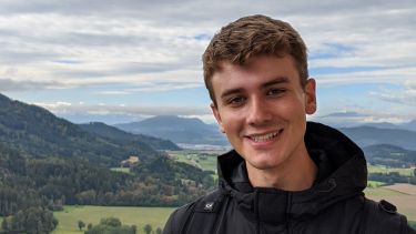 Student on this Year Abroad against alpine background