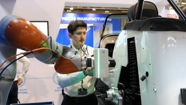 Operator working with a robot
