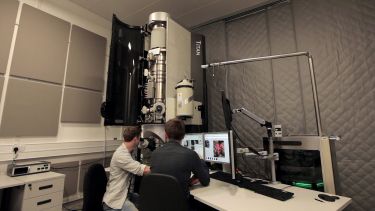Students working with the Titan machine